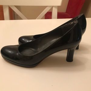 Stuart Weitzman black patent pumps